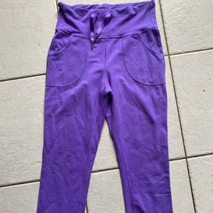 Lululemon size 6 purple leggings with pockets